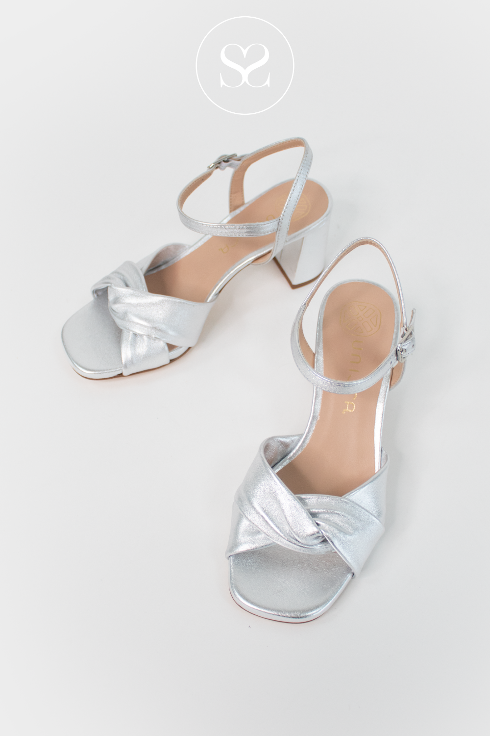 UNISA MEDWAY METALLIC SILVER LEATHER BLOCK HEEL SANDALS WITH ADJUSTABLE ANKLE STRAP AND TWIST KNOT FRONT STRAP