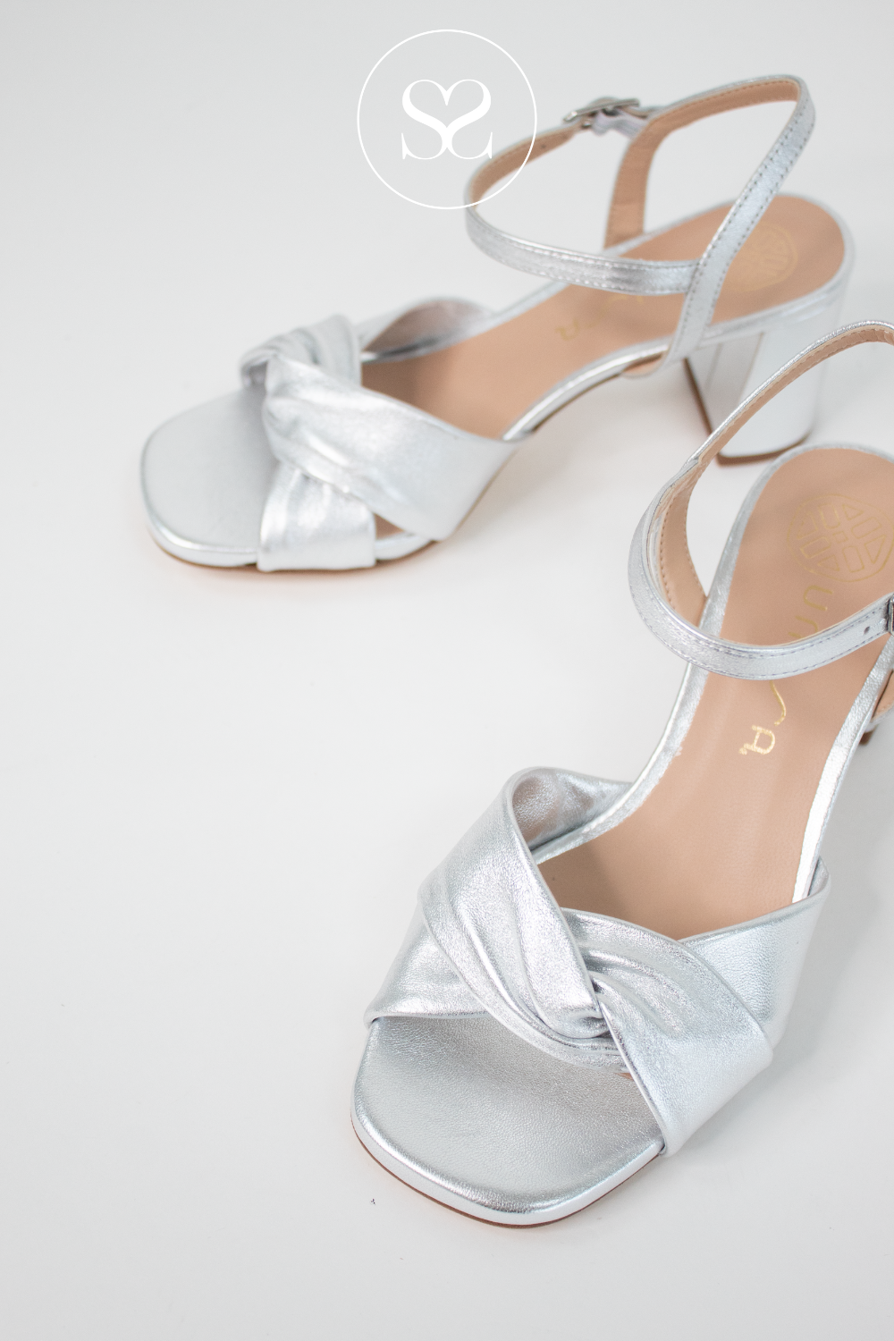 UNISA MEDWAY METALLIC SILVER LEATHER BLOCK HEEL SANDALS WITH ADJUSTABLE ANKLE STRAP AND TWIST KNOT FRONT STRAP