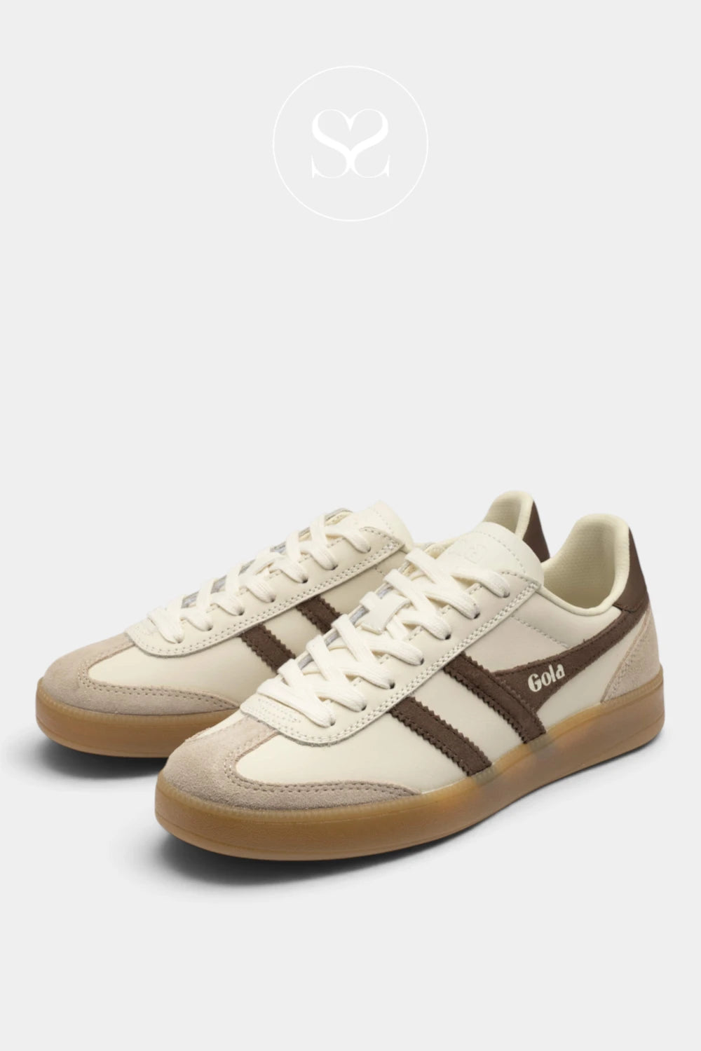 A pair of low-top sneakers in cream and brown suede, featuring a gum sole and the brand name 'Gold' on the side, set against a light gray background.