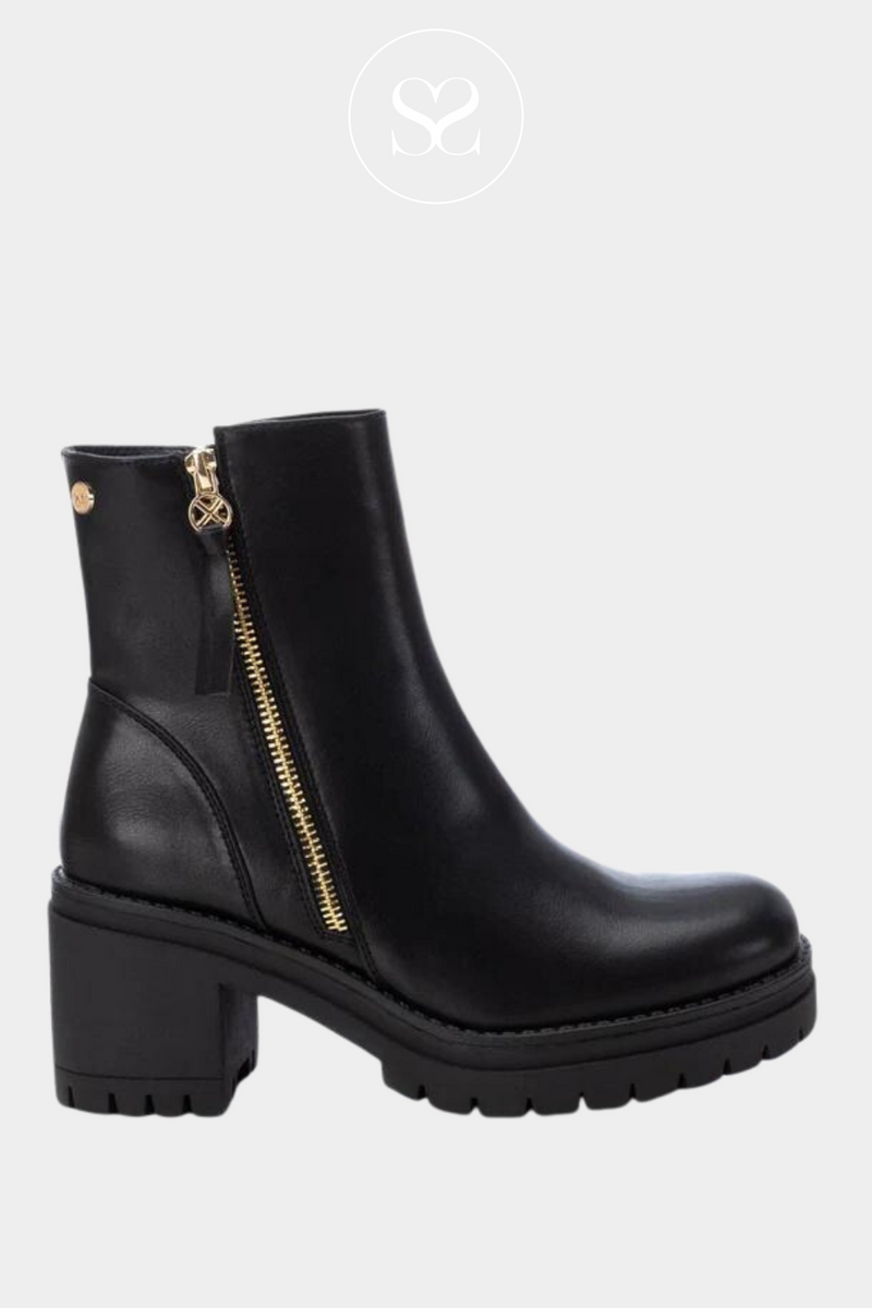 black heeled ankle boots from XTI