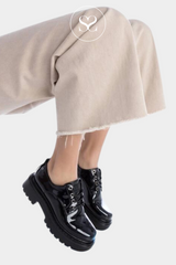 Woman wearing xti 142003 chunky patent shoes