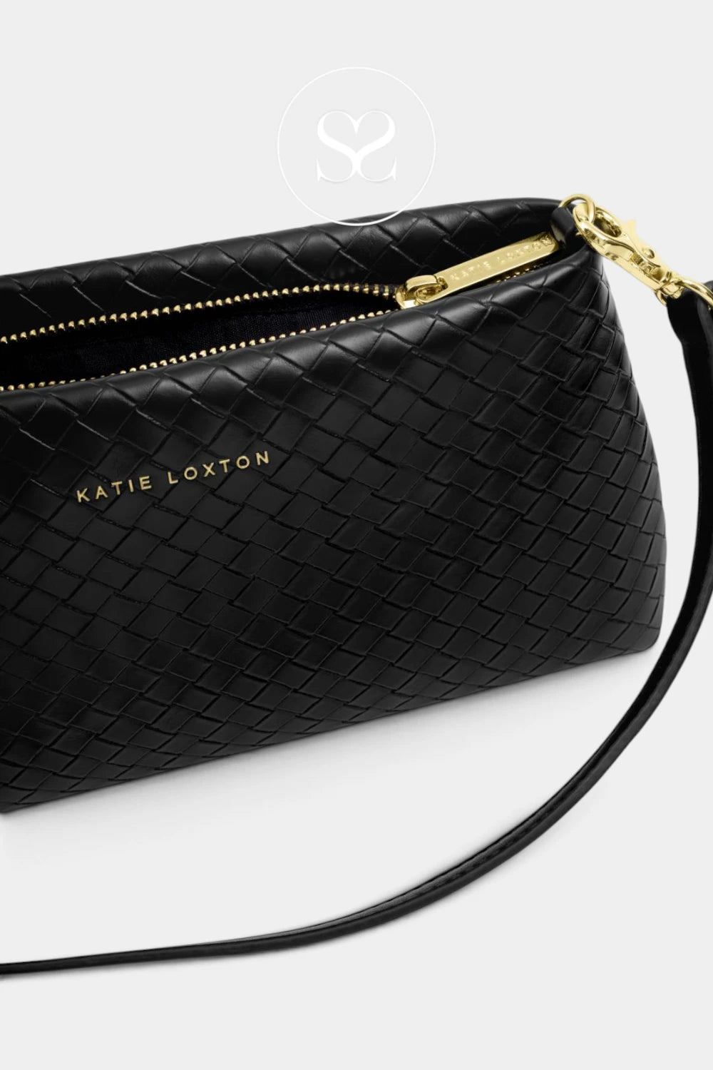 A black woven leather wristlet clutch by Katie Loxton with gold-tone hardware and zipper, shown on a light gray background.