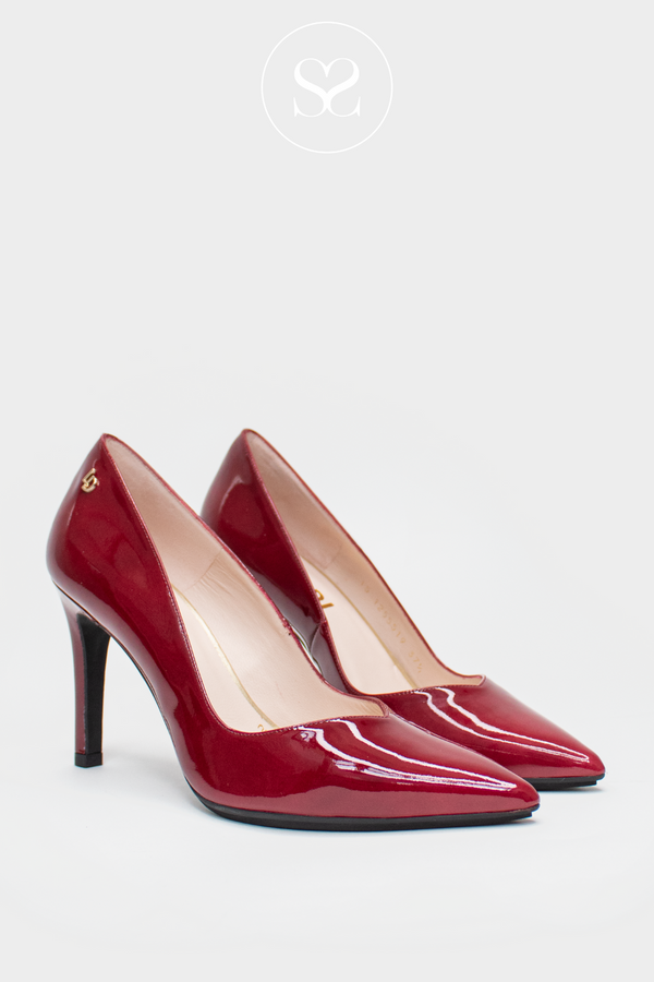 LODI RABOT COURT SHOES IN WINE PATENT. THESE HIGH HEEL STILLETTOES HAVE A POINTED TOE AND ELEGANT V-CUT FRONT