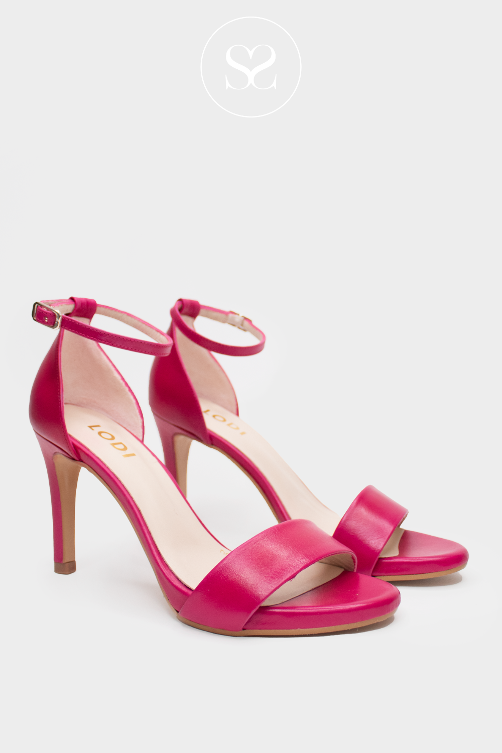 LODI BARELY THERE SANDALS IN HOT PINK