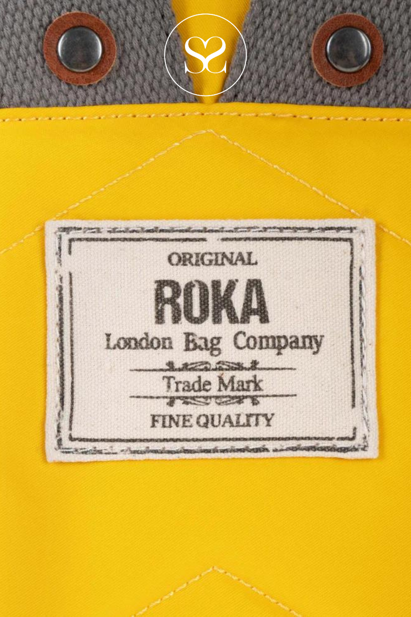 ROKA CANFIELD B YELLOW WATERPROOF BACKPACK BAG WITH GREY STRAP AND FRONT ZIP POCKET