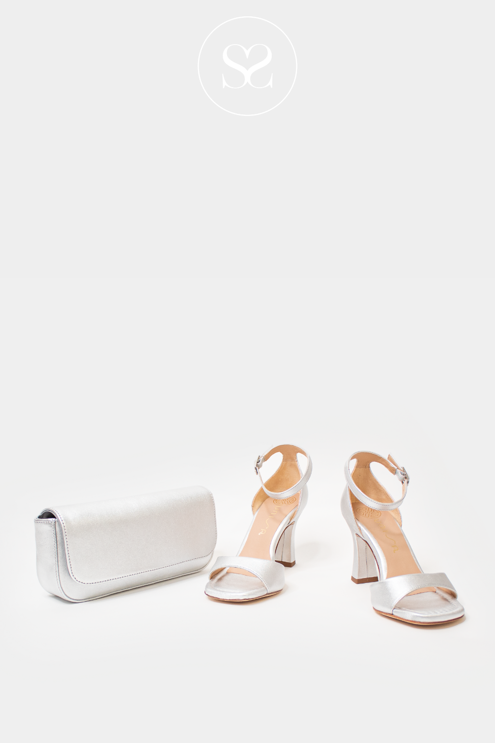 SILVER CLUTCH AND SANDALS FROM UNISA