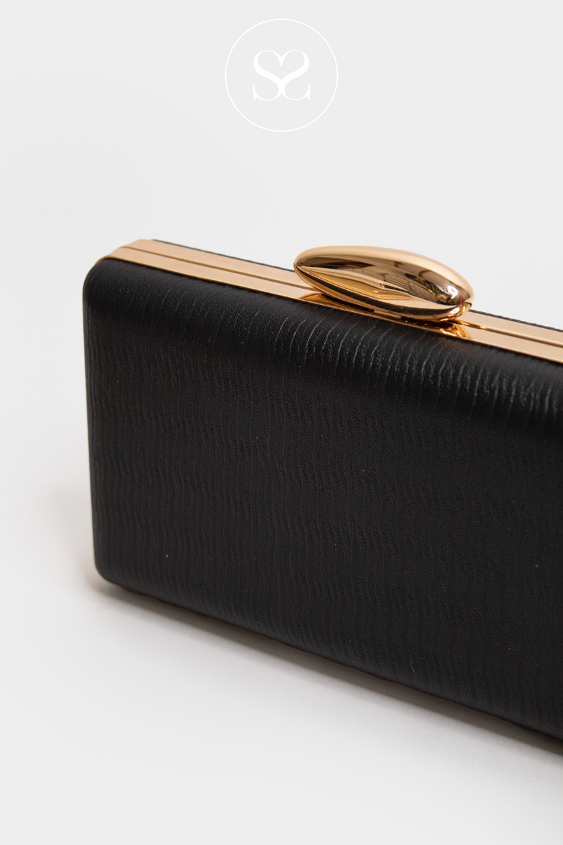 black/gold clutch bag